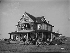 [American Gathering of Sixteen People]